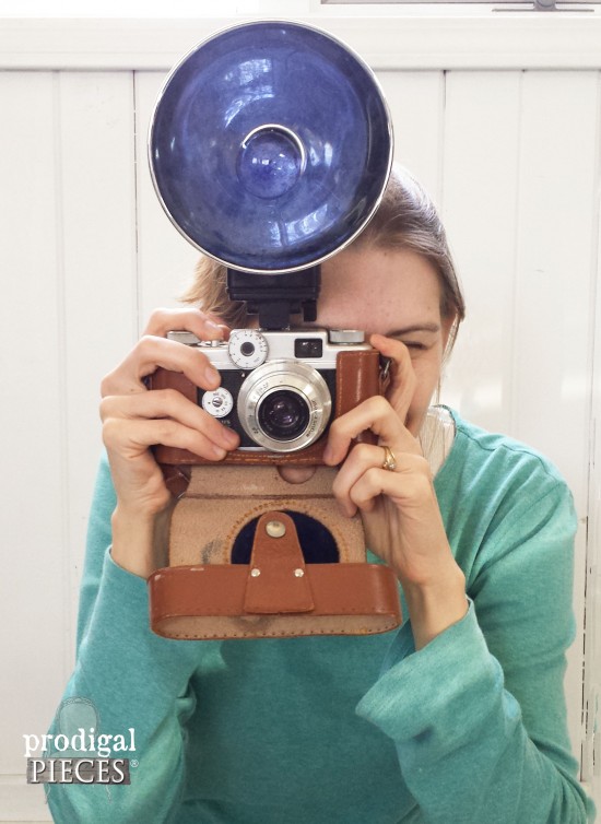 Larissa and a vintage camera she scored.