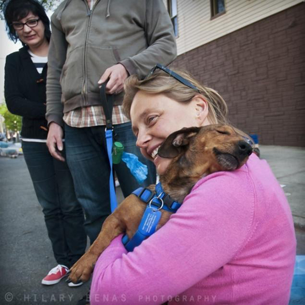 a very touching photograph of a grateful pup reunited with her rescuer -- one of 8 picks for this week's Friday Favorites