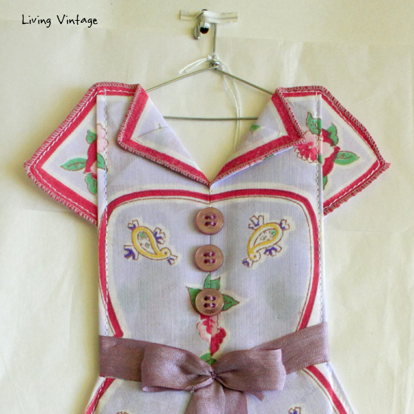 the detail of an adorable miniature dress made with a vintage hanky! --- Living Vintage