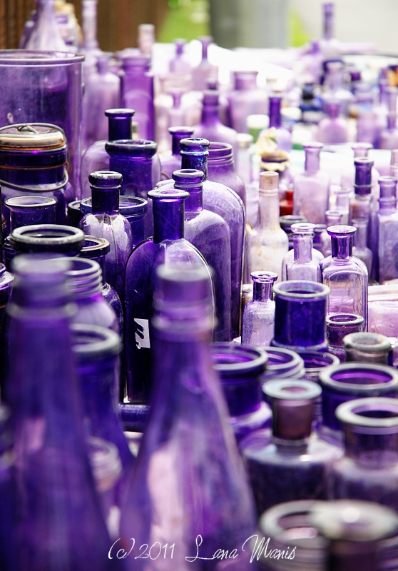 old purple bottles for sale at a stop on The World's Longest Yard Sale - one of 8 picks for this week's Friday Favorites