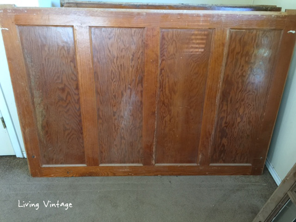 Old doors for sale -- they were mounted on a wall and hinged at the top!