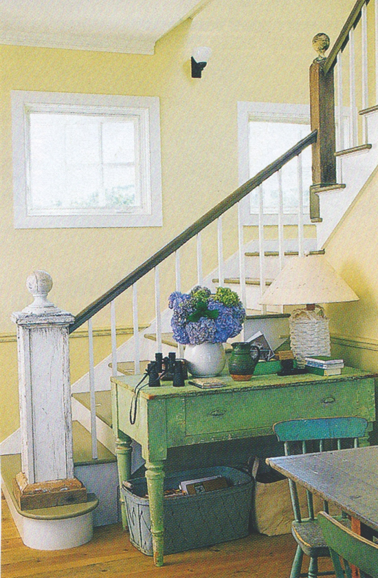 an old table is always handy by the entryway (See more photos of this One Cool House @ Living Vintage)