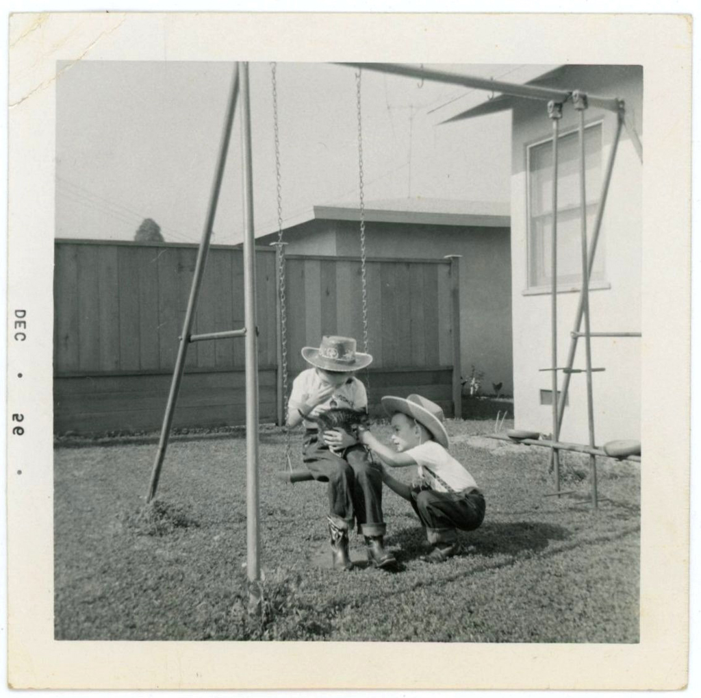 such a sweet photo of two kids playing with their kitten - one of 8 picks for this week's Friday Favorites