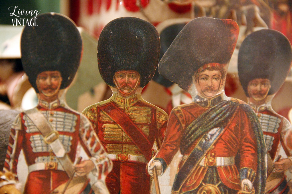 4 paper band members, part of an elaborate Christmas display of antique collectibles